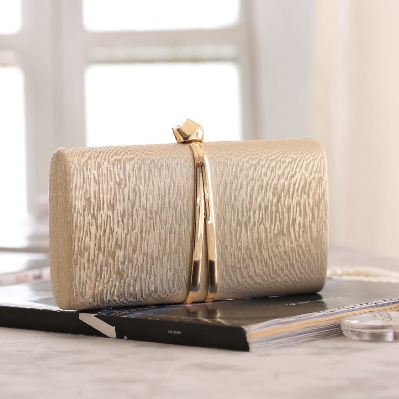 Textured Clutch Bag with Gold Metal Accent